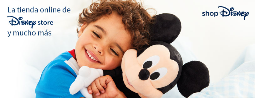 boy hugging mickey mouse